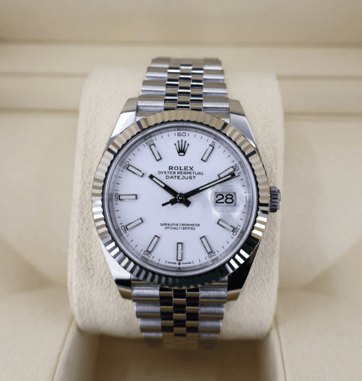 Rolex Datejust with fluted bezel in white gold showing the classic dress watch design
