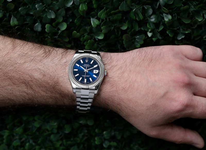 Rolex Datejust on wrist in a lifestyle setting showing its versatility