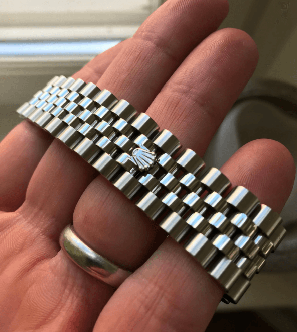 Close-up of the Rolex Jubilee five-link bracelet showing the refined link construction