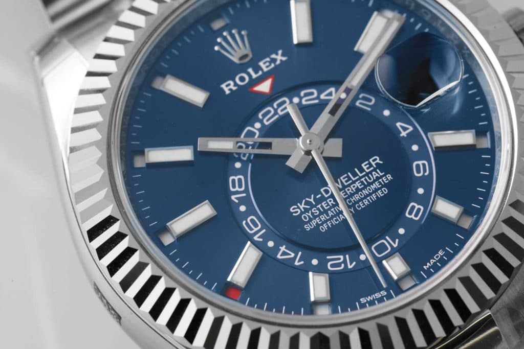 Rolex Oyster Perpetual Sky-Dweller in steel showing the fluted Command Bezel