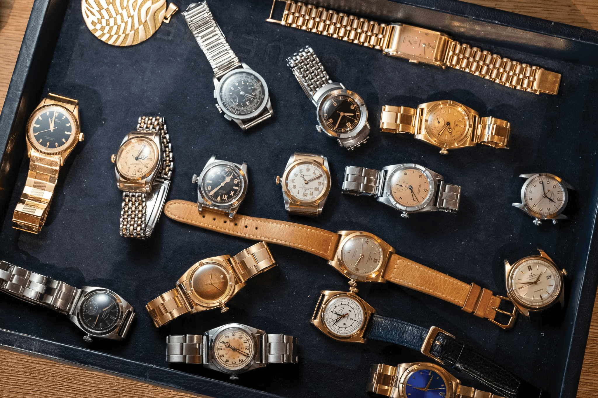 Collection of vintage Rolex watches showing natural patina and aging across different models