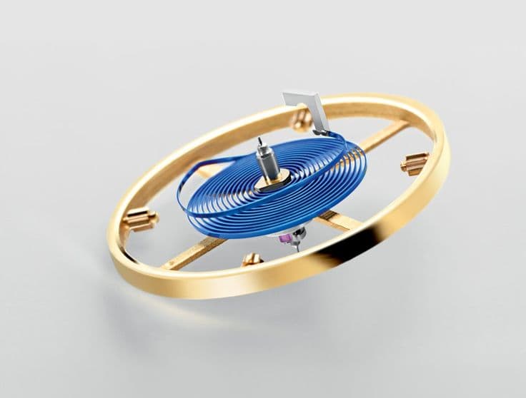 Close-up of the Rolex Parachrom blue hairspring showing the distinctive blue color